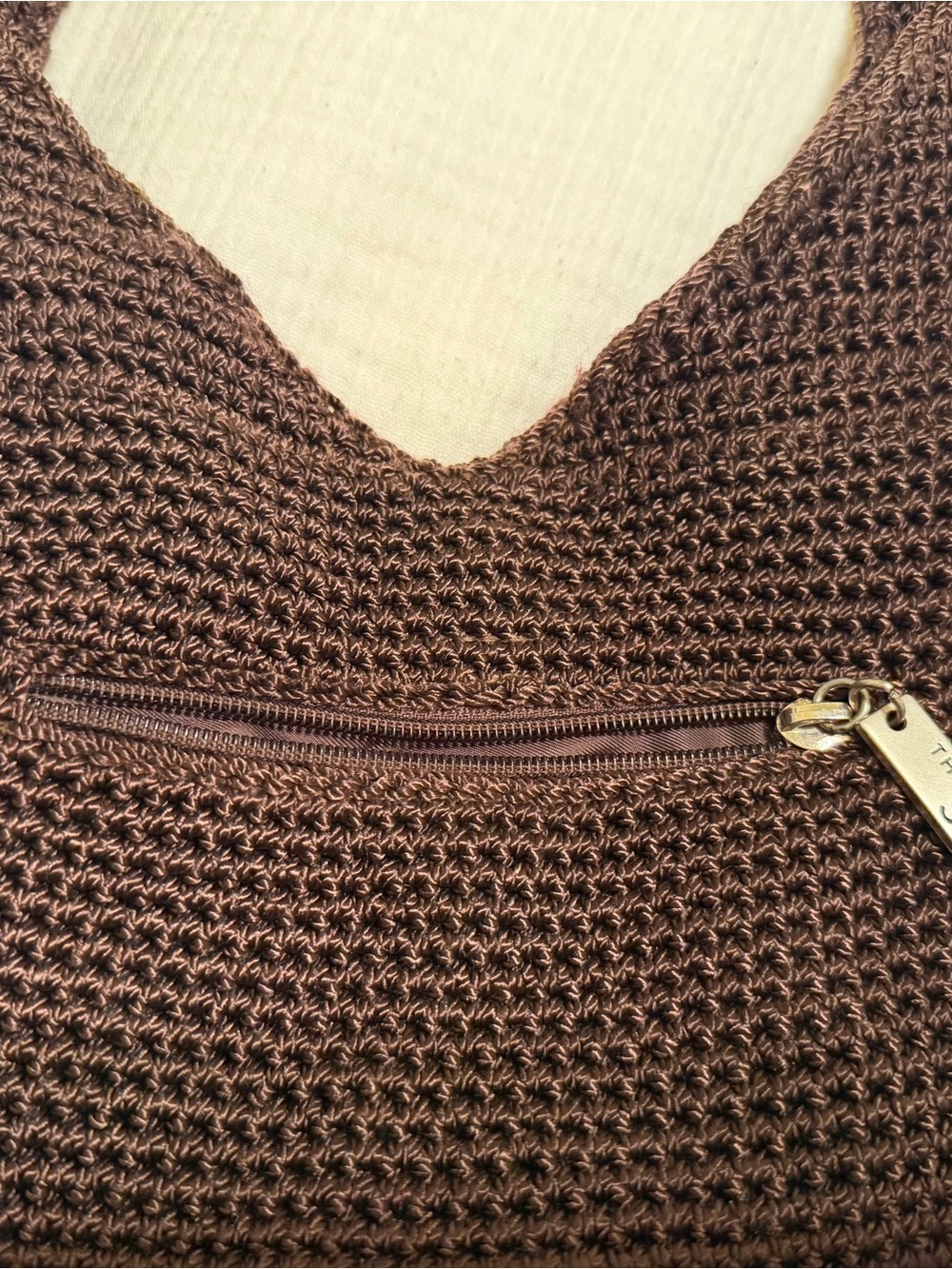 The Sak Brown Crochet Hobo Bag with Gold Accent